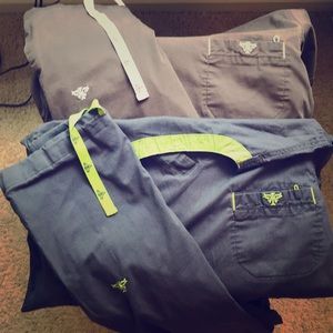 Set of two scrubs med tops/sm bottoms